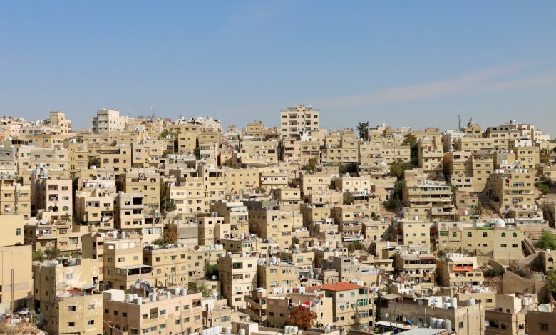 Dense urban landscape across the hills of Amman, Jordan.