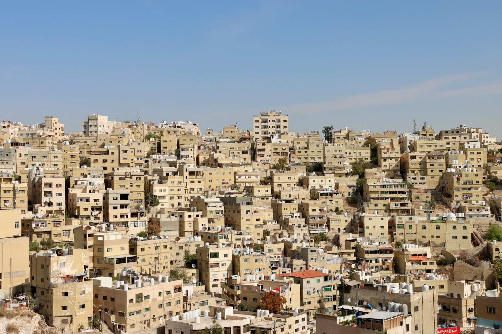 Dense urban landscape across the hills of Amman, Jordan.