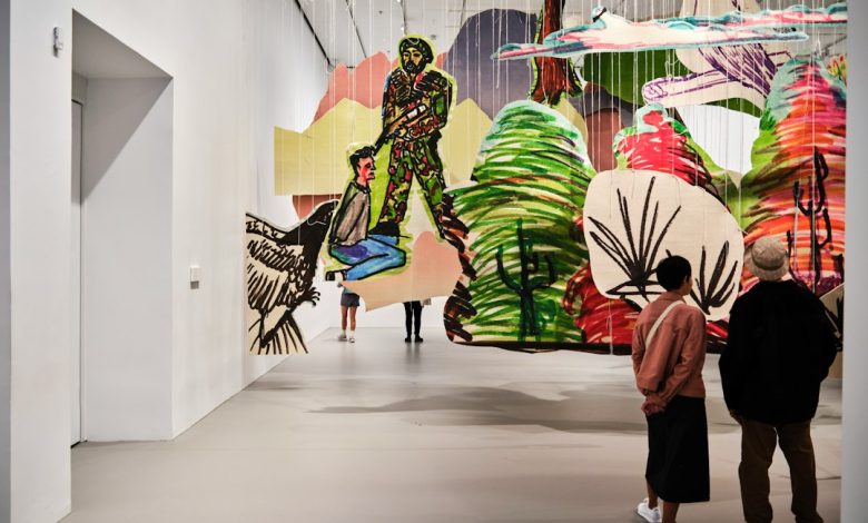 Visitors viewing contemporary objects in a design exhibition