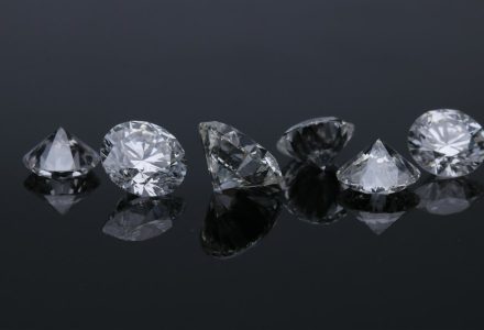 Close-up view of polished diamonds reflecting light