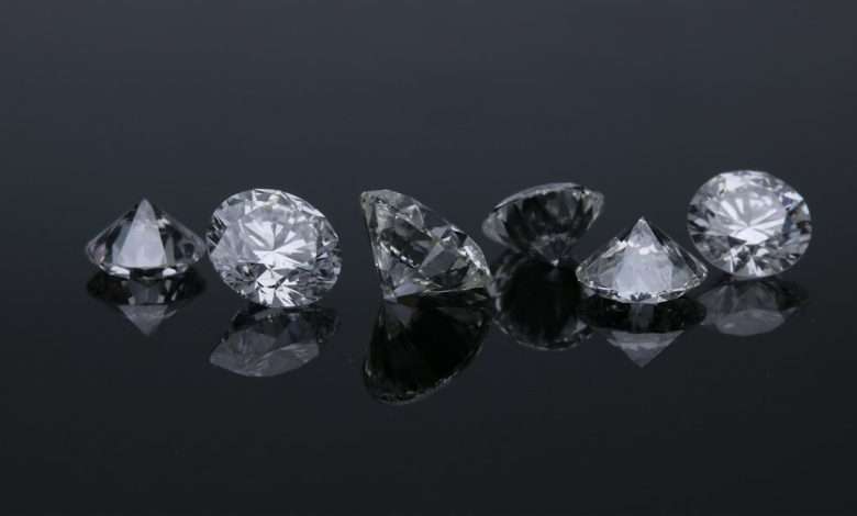 Close-up view of polished diamonds reflecting light