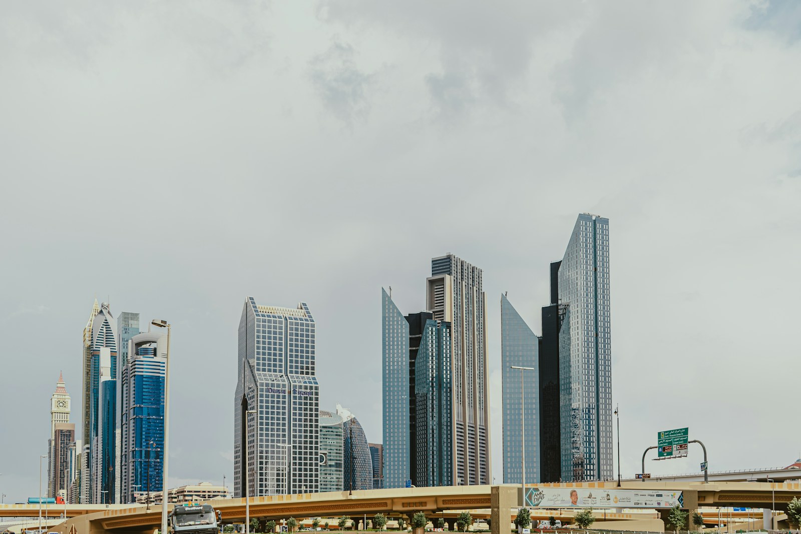 Modern towers and road infrastructure in Dubai's financial district.