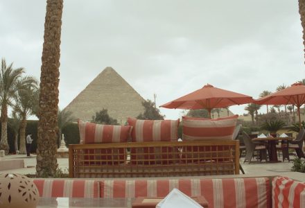 A hospitality terrace overlooking a pyramid illustrating Egypt’s luxury tourism and experience-design opportunity