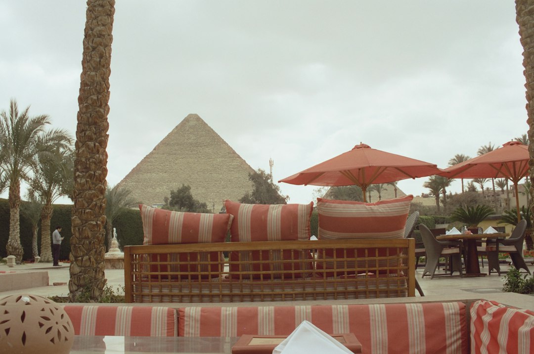 A hospitality terrace overlooking a pyramid illustrating Egypt’s luxury tourism and experience-design opportunity