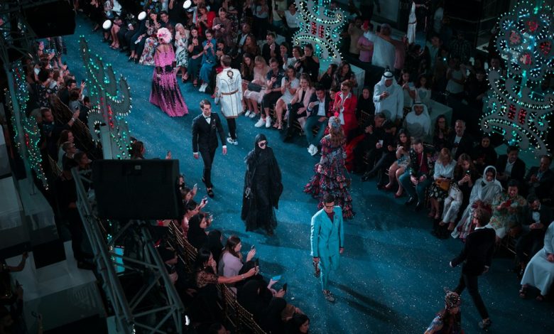 Models presenting a collection on a fashion runway