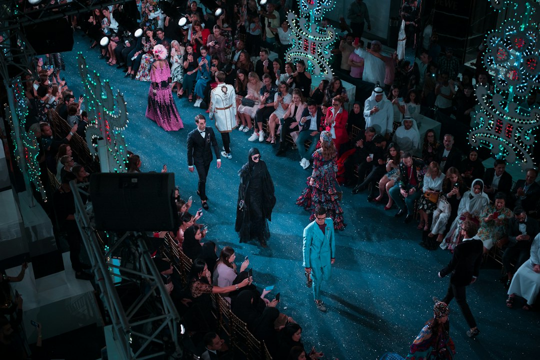 Models presenting a collection on a fashion runway